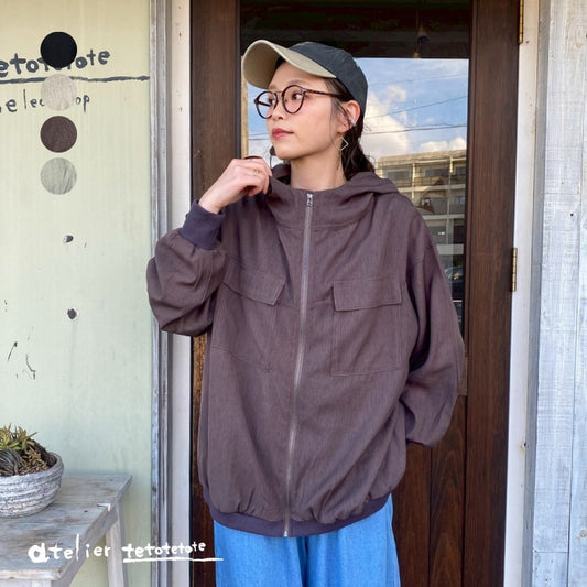 261032　シアー無地布帛フードジップシアーカーデ